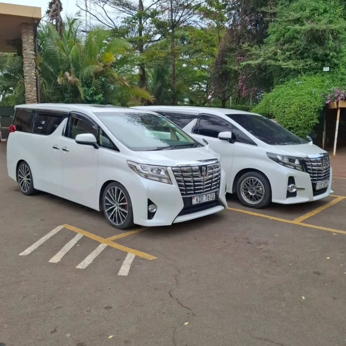 Smooth hotel transfer service dropping guests at a luxury Ugandan resort