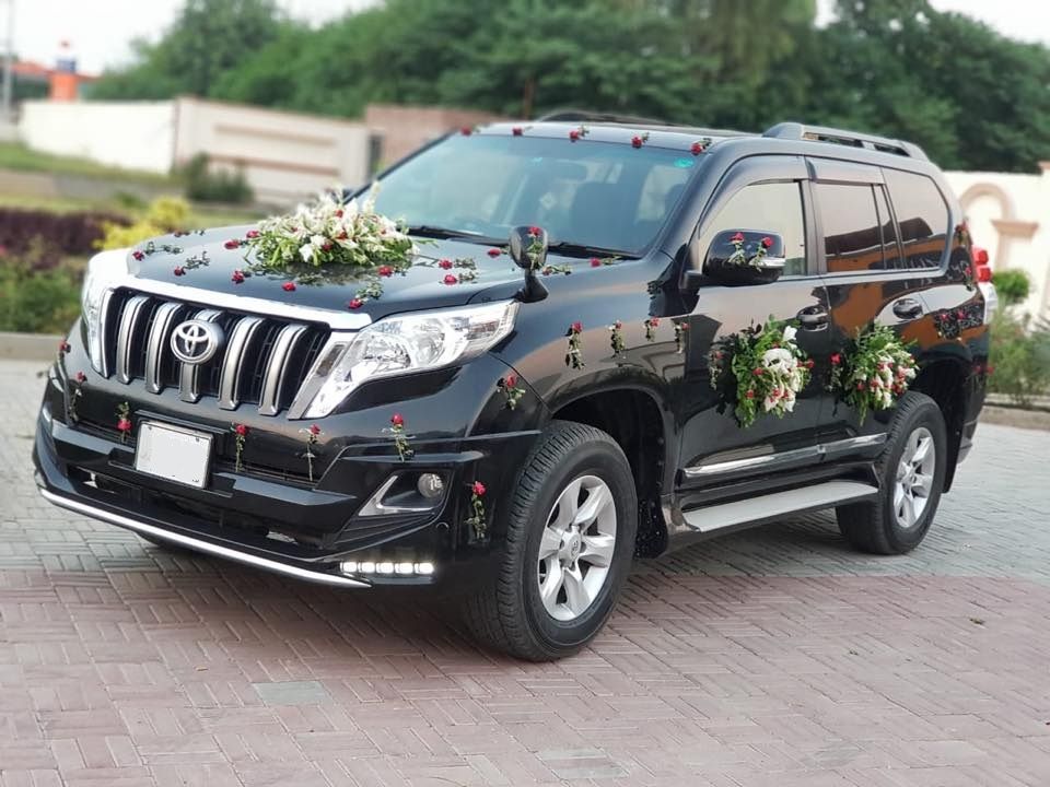 Luxury wedding car decorated for bridal party transport in Uganda